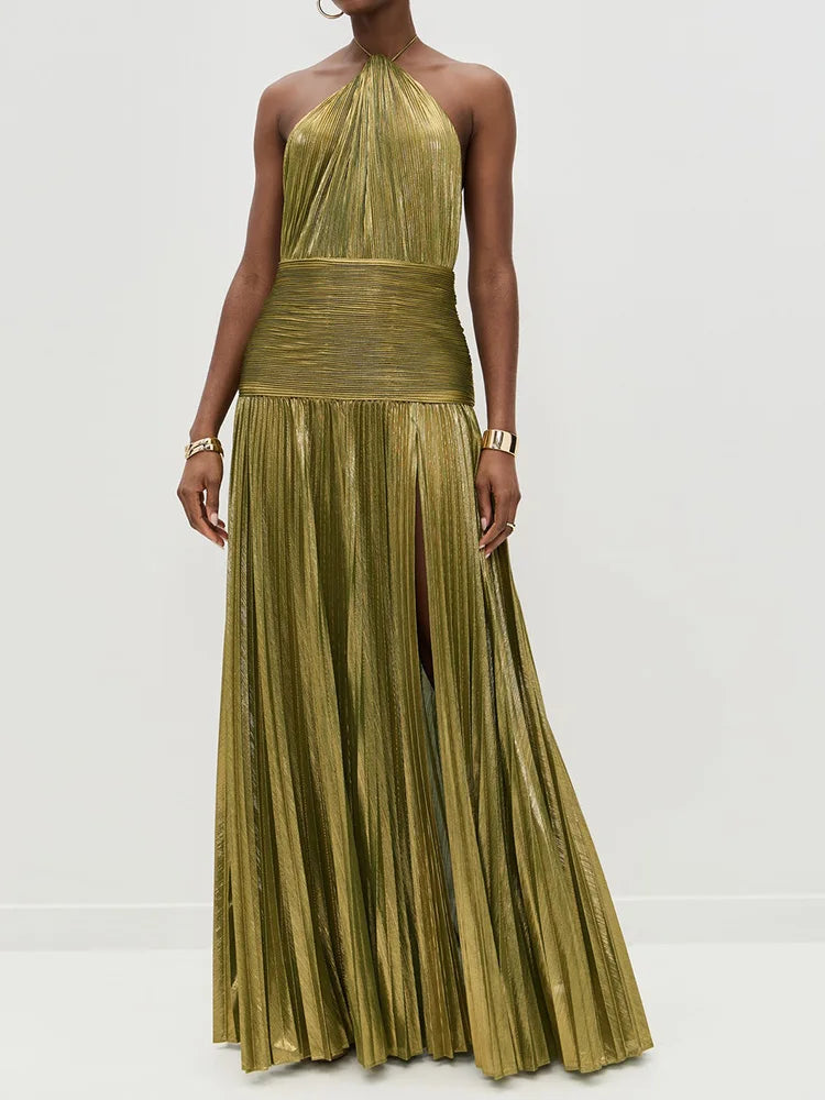 Front view of model in gold pleated halter maxi dress displaying the complete look and fit of the formal gown