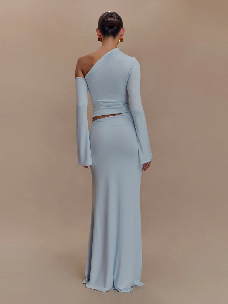 Back view of women's maxi skirt and top set