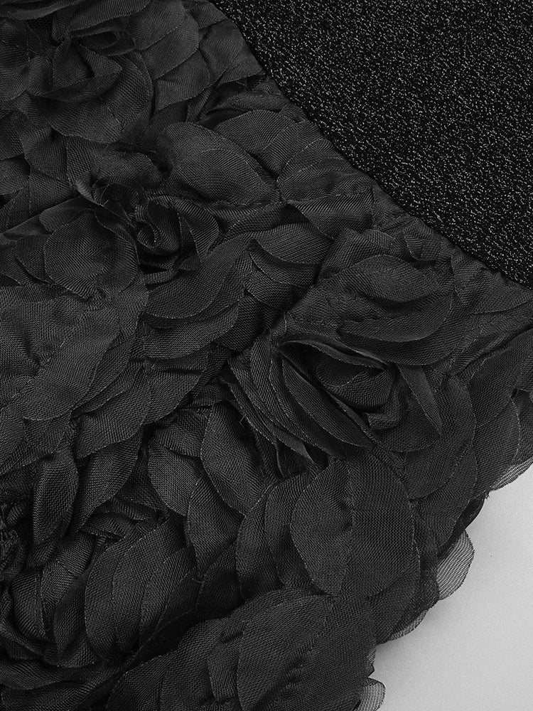 Close-up macro shot of vibrant floral trumpet hem fabric showing intricate flower patterns and color details  